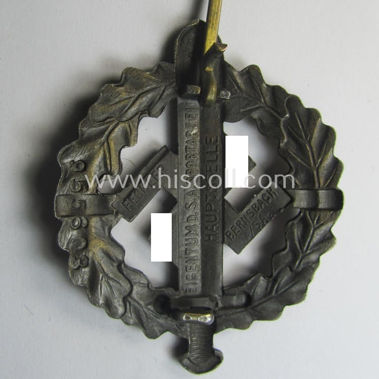 Early- (ie. pre-) war-period example of an: 'SA-Sportabzeichen in Bronze' being a detailed and/or neatly maker- (ie. 'Fechler - Bernsbach i. Sa.'-) marked example that shows an impressed bearers'-number (ie. '955603')