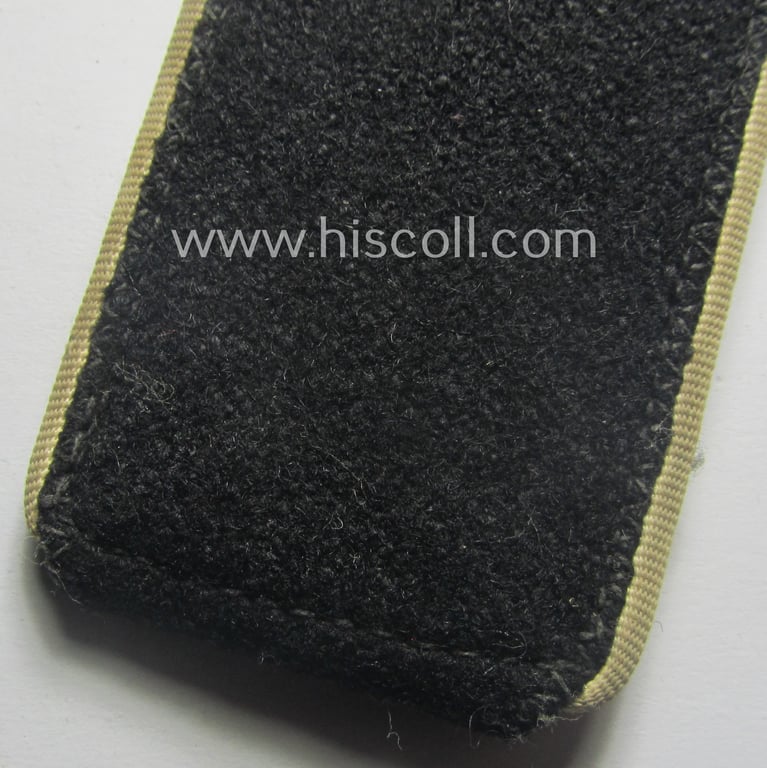 Single, Waffen-SS, EM-type shoulderstrap as piped in the white-coloured branchcolour: 'SS-Mann der Infanterie-Trpn.'