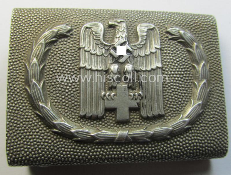 DRK (ie. 'Deutsches Rotes Kreuz'), enlisted-mens'- (ie. NCO-) type belt-buckle being a maker- (ie. 'OLC'-) marked example