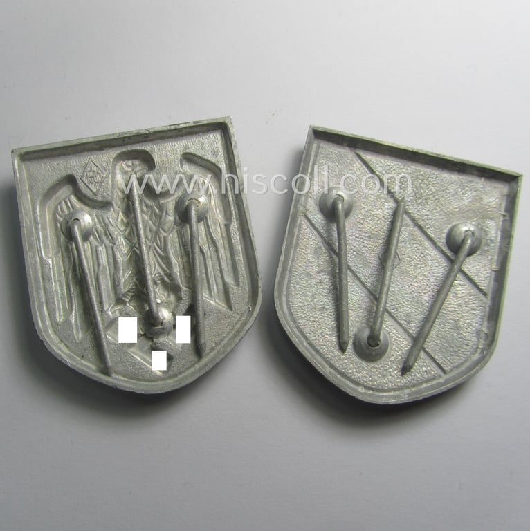 'Virtually mint ie. unissued' pair of WH (Heeres) tropical- (ie. 'DAK'- or: 'Deutsches Afrikakorps'-) related- and/or aluminium-based, eagle-'pith-helmet'-shields comprising of two maker- (ie. 'P&C'-) marked examples