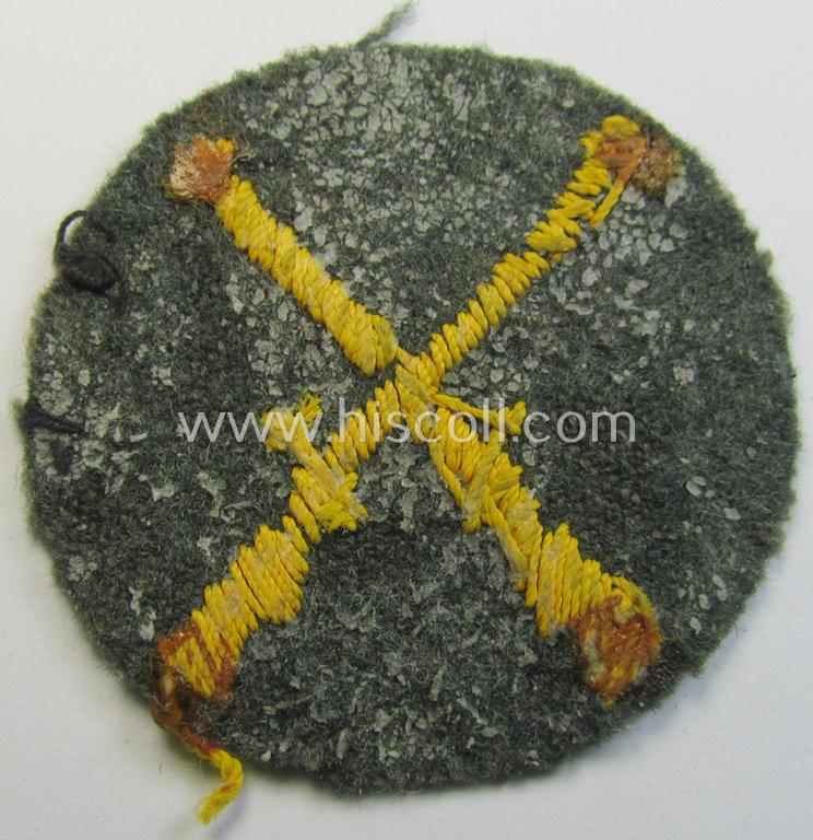 Truly used- and/or tunic-removed, WH (Heeres) trade- and/or special-career insignia (ie. neatly hand-embroidered 'Laufbahn- o. Tätigkeitsabzeichen') as was intended for a: 'Waffenmeister' (or: weapon-equipment NCO)