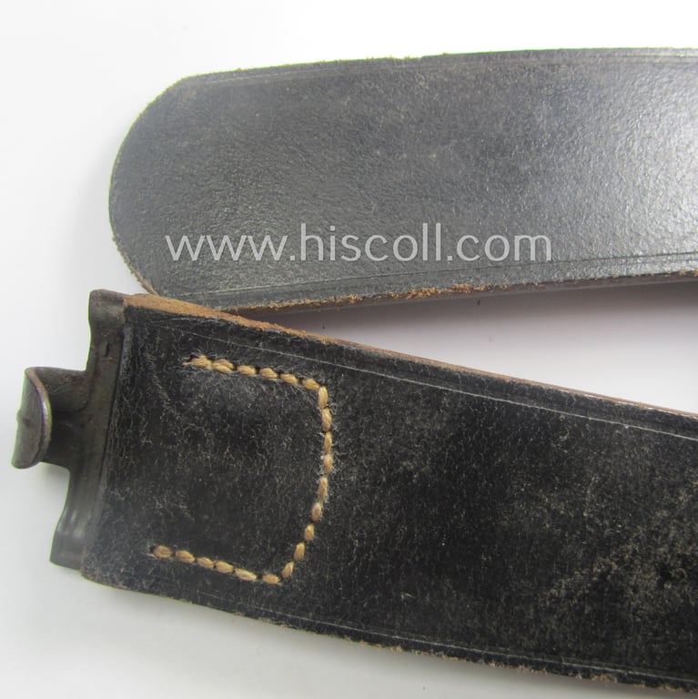 Hardly used, mid- (ie. later-) war-period, black-coloured WH (Heeres, Luftwaffe, Waffen-SS etc.) 'standard-issue'-pattern belt (ie. 'Koppelriemen') being a 110 cms. sized example that shows a (clear) makers'-designation (ie. 'RbN'-numeral)