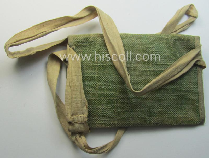 Aluminium-based WH (Luftwaffe) ie. 'Luftnachrichten'-related ID-disc (ie. 'Erkennungsmarke') bearing the stamped unit-designation that reads: 'Ln.Stelle mot - E63' and that comes stored in its period (linnen-based) pouch