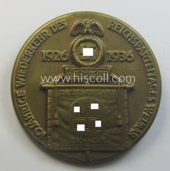 Golden-bronze-toned, N.S.D.A.P.-related day-badge (ie. 'tinnie' or: 'Veranstaltungsabzeichen'): '10...