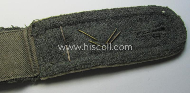 Attractive - moderately used albeit regrettably single! - neatly 'cyphered', so-called: 'M41- (ie. M43-) pattern', WH (Heeres) NCO-type shoulderstrap as was specifically intended for a: 'Feldwebel des Maschinengewehr-Abteilungs 4'