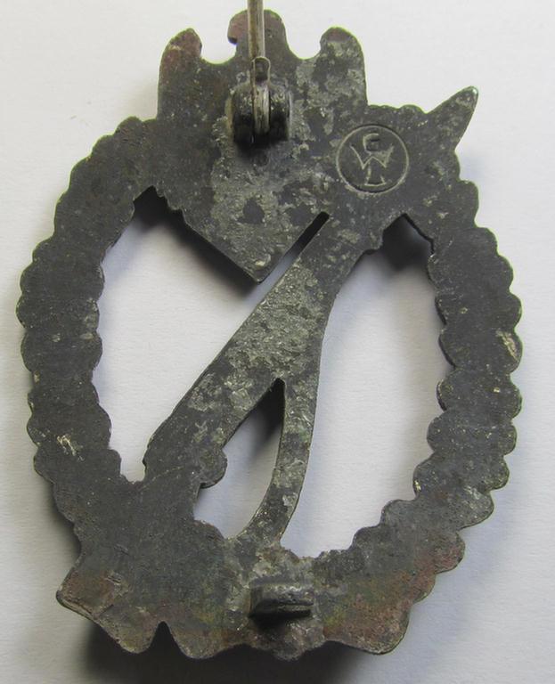 'Infanterie-Sturmabzeichen in Silber' (or: silver-class IAB) being a clearly maker- (ie. 'GWL'-) marked, zinc- (ie. 'Feinzink'-) version ie. molded-'variant' as was procuded by the: 'Gebrüder Wegerhoff'-company