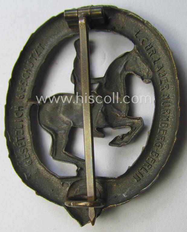 'Deutsches Reiterabzeichen der 3. Klasse (ie. 'in Bronze') being a maker- (ie. 'L.Chr. Lauer'-) marked example