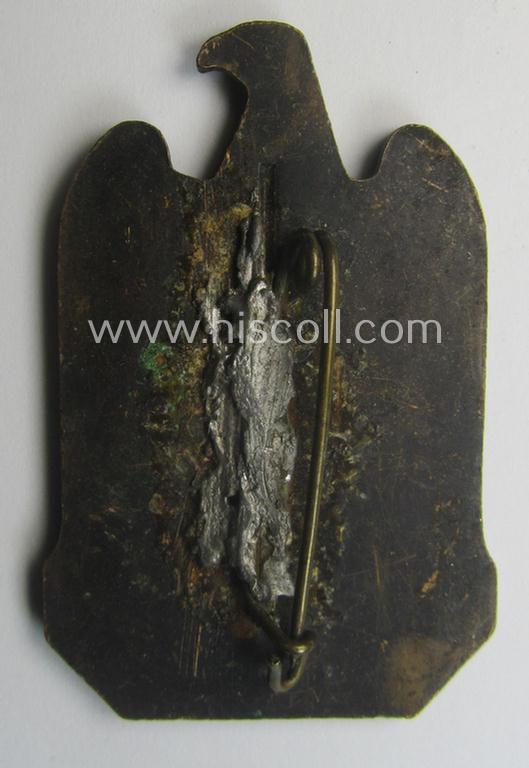 Repaired, N.S.D.A.P.-related 'tinnie' (ie. 'Tagungs- o. Veranstaltungsabzeichen'-) being a non-maker-marked, 'solid-back'-pattern and/or golden-bronze-toned example showing the text: 'N.S.D.A.P. Reichsparteitag - Nürnberg 1933'