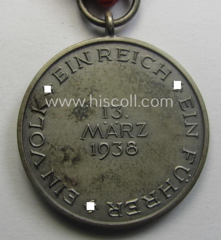 WH Austrian-occupation- (ie. 'Anschluss'-) medal: '13. März 1938' being a very attractive (albeit somewhat tarnished) example that comes stored in its bright-red-coloured- and/or typical non-maker-marked etui as issued