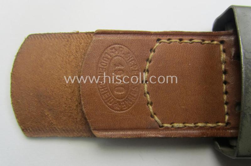 'Virtually mint', 'standard-issue'-pattern, WH (Heeres) field-grey-toned- and steel-based belt-buckle being a maker- (ie. 'R.S.&S.'-) marked example that comes mounted onto its 'R. Sieper u. Söhne'-marked and/or '1940'-dated tab