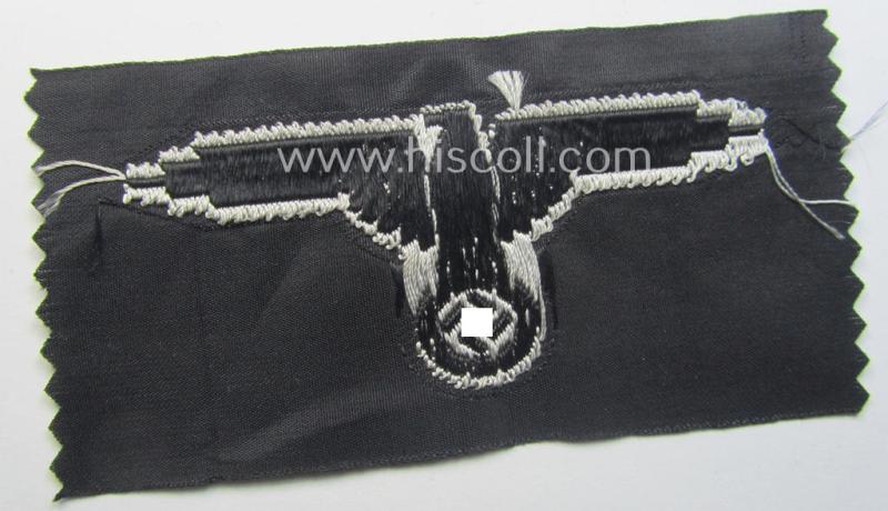 Mid- (ie. later-war-) pattern, 'SS' (ie. 'Waffen-SS') so-called: 'BeVo-weave-style', enlisted-mens'- ie. NCO-pattern arm-eagle (ie. 'Ärmeladler für Mannschaften u. Unterführer') as was intended for usage by the various Waffen-SS-troops