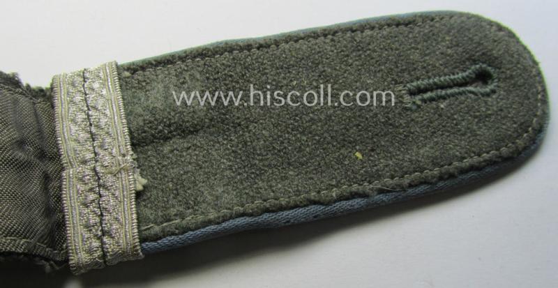 Single, mid-war period- (ie.: 'M43'-pattern) WH (Heeres) EM-type shoulderstrap: 'Soldat u. Offz.-Anw. einer Nachschub-Abtlgs.'