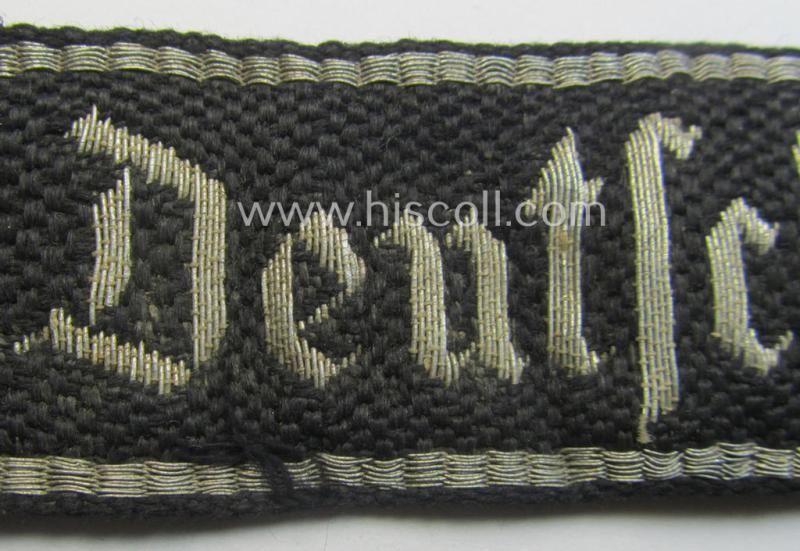 Relic- (ie. clearly shortened), Waffen-SS officers-type cuff-title (ie. 'Ärmelstreifen') as executed in flat-wire 'BeVo'-weave-pattern (in Gothic-styled script!) for an officer in the: SS-Rgt. 'Deutschland' (2. SS-Pz.-Div. “Das Reich”)