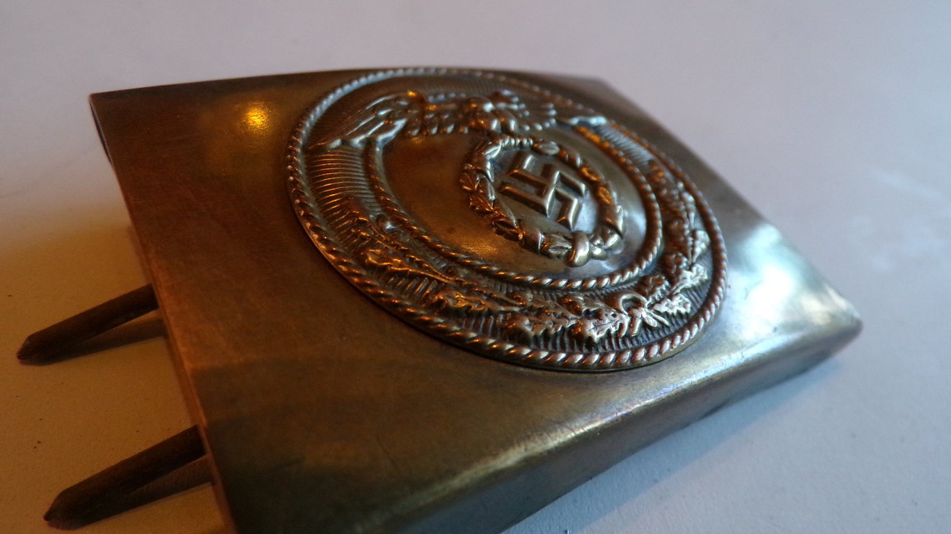 S.A brown leather belt and buckle