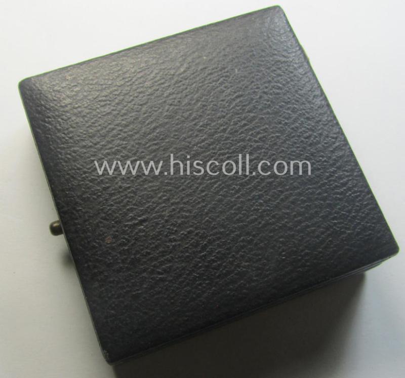 'Verwundeten-Abzeichen in Gold' being a maker- (ie. '30'-) marked- and typical 'Buntmetall'-based example that comes stored in period etui as issued