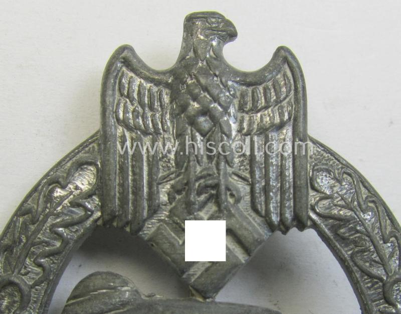 'Panzerkampfabzeichen in Silber' (or: silver-class panzer-assault badge or PAB) being a clearly maker- (ie. 'AS' in a triangle-) marked- and/or typical zinc- (ie. 'Feinzink'-) based specimen as was procuced by a to date unknown maker