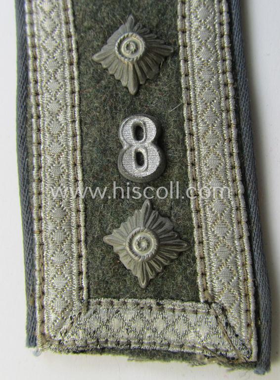 Single - I deem mid-war-period - so-called: 'M40 o. M43'-pattern, WH (Heeres) NCO-type shoulderstrap as piped in the light-blue-coloured branchcolour as was intended for usage by an: Oberfeldwebel des Nachschub-Abts. 8'