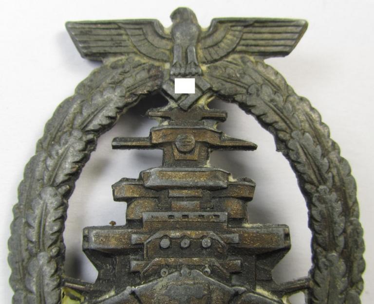 WH (Kriegsmarine) 'Flottenkriegsabzeichen' (or: high-sea fleet badge) being a typical zinc- (ie. 'Feinzink'-) based and/or (I deem) later-war-period version that is neatly maker- (ie. 'Fec. Adolf Bock') marked on its back