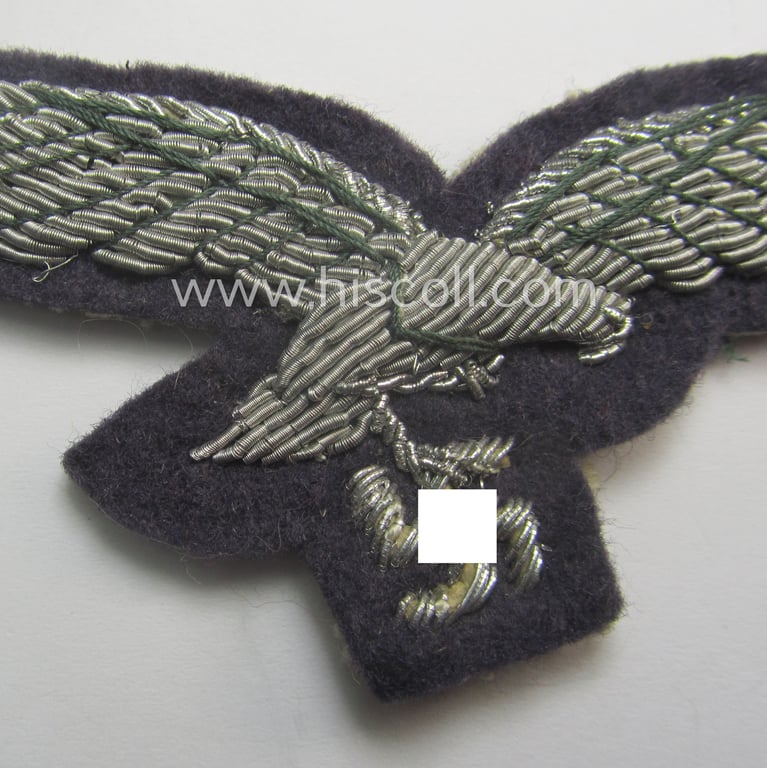 'Virtually mint' WH (Luftwaffe) officers'-pattern breast-eagle (ie. 'Brustadler für Offiziere der Luftwaffe') being a neatly hand-embroidered example of the: 'Extra Qualität' that comes in a never used- nor tunic-attached, condition
