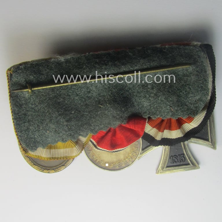 3-pieced, WWII- (ie. TR-) period medal-bar (ie. 'Ordenspange') showing resp. an: 'EKII.Kl.', an Austrian 'Anschluss'-medal '13. März 1938' and a: 'Westwall'-medal