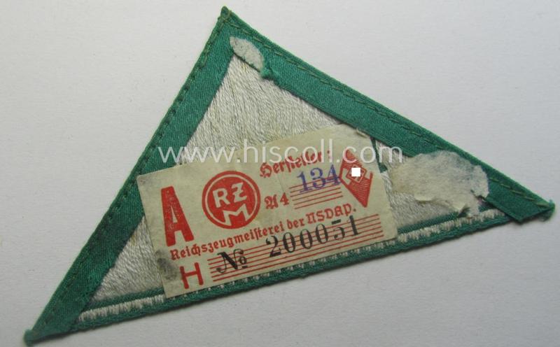 HJ (ie. 'Hitlerjugend') honorary-district-triangle (ie. 'Gebietsdreieck') entitled: 'Landjahr' being an example that still retains its 'RzM'-etiket and that comes in an overall very nice (albeit just moderately used ie. worn condition)