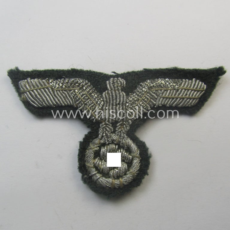 Clearly used- and/or cap-removed, WH (Heeres) officers'-pattern, visor-cap eagle/cocarde-set (ie. 'Effektensatz für Schirmmütze') being both hand-embroidered examples that come mounted onto a darker-green-coloured- and/or woolen-based background