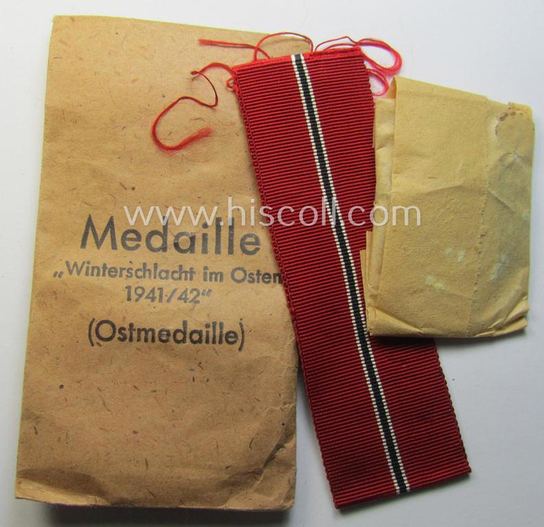Superb medal-set: 'Winterschlacht im Osten 1941/42' as produced by the: 'Deschler u. Sohn'-company (being a non-maker-marked specimen that came stored in its original 'Zellstoff'-based pouch of issue as found)
