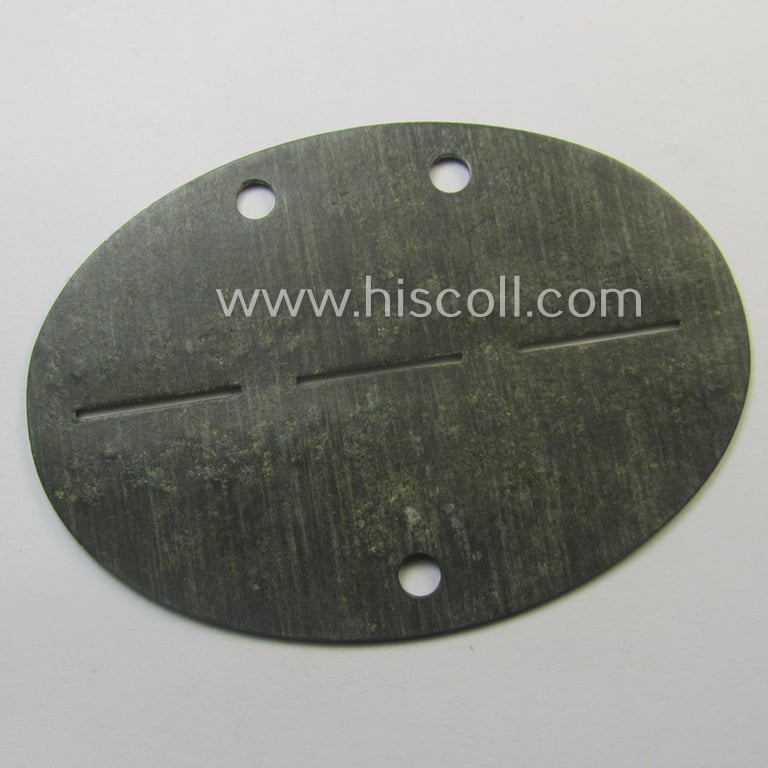 Zinc-based, WH (Luftwaffe) ie. 'Hermann Göring-Division'-related ID-disc, bearing the stamped unit-designation: '3./1.Fsch.E.u.A.Brig. H.G.1' and that comes as issued and/or clearly worn
