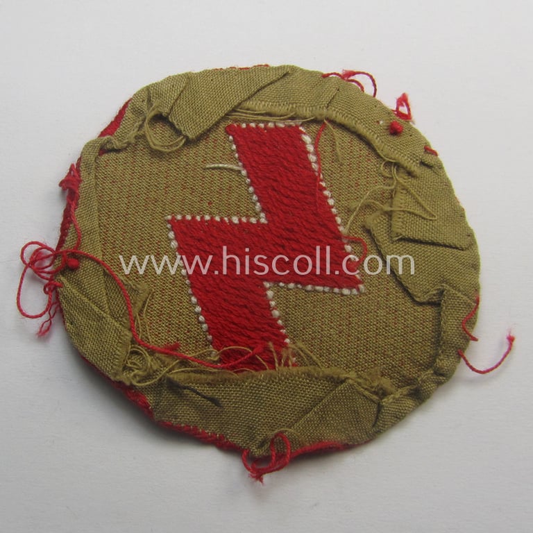 DJ (ie. 'Deutsches Jungvolk') arm-badge as was specifically intended for usage by a member who served within the: 'Oberbann 1' (being a moderately used- and carefully shirt-removed example that is void of an 'RzM'-etiket)