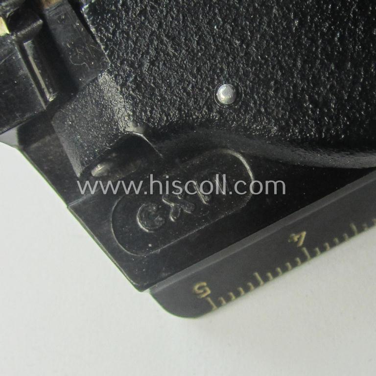 'Standard-issue'-pattern WH compass (or: 'Marschkompass') as executed in black-coloured 'Bakelite' being - I deem - a later-war-period- and/or maker- (ie. 'CXN'-) marked example that comes mounted on its period cord