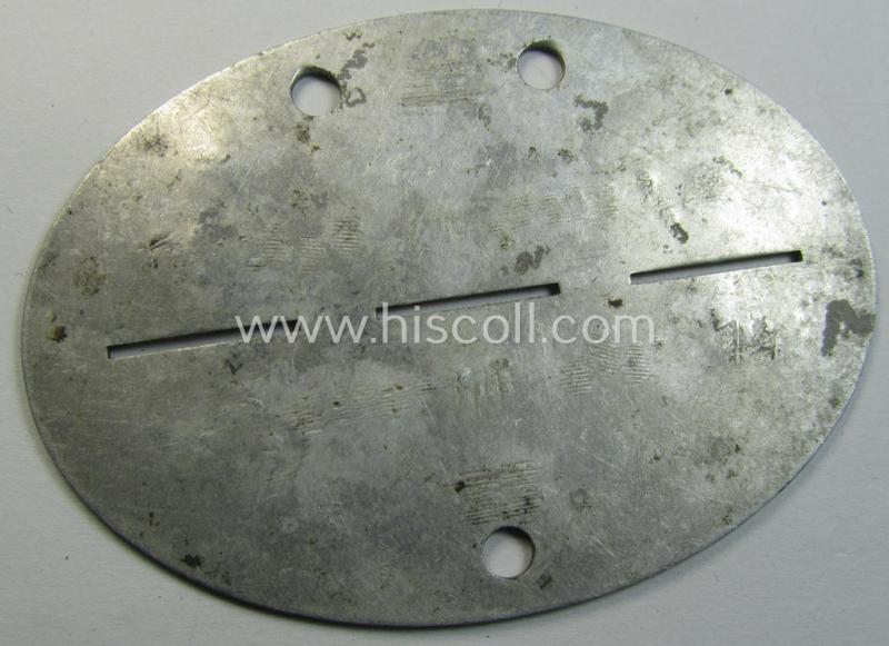 Aluminium-based, WH (Heeres) 'Eisenbahn-Pioniere'- (ie. railway-engineers-) related ID-disc bearing the clearly stamped unit-designation that reads: '4./Eisb.Pi.Rgt. 68' and that comes as issued- and/or worn