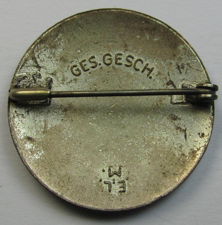 Attractive example of a DRK (ie. 'Deutsches Rotes Kreuz' or German Red Cross) nurses'-badge as was intended for a: 'Helferin' being a maker- (ie. 'E.L.M.'-) marked example that comes in a fully untouched condition