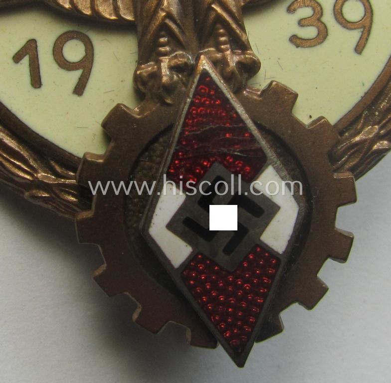 'HJ'- ('Hitlerjugend') ie. 'BDM'- ('Bund Deutscher Mädel') related: 'Reichsberufswettkampf-Siegerabzeichen' (of the 2nd model) entitled: 'Kreissieger 1939' and being a neatly maker- (ie.: 'H. Aurich'-) marked example