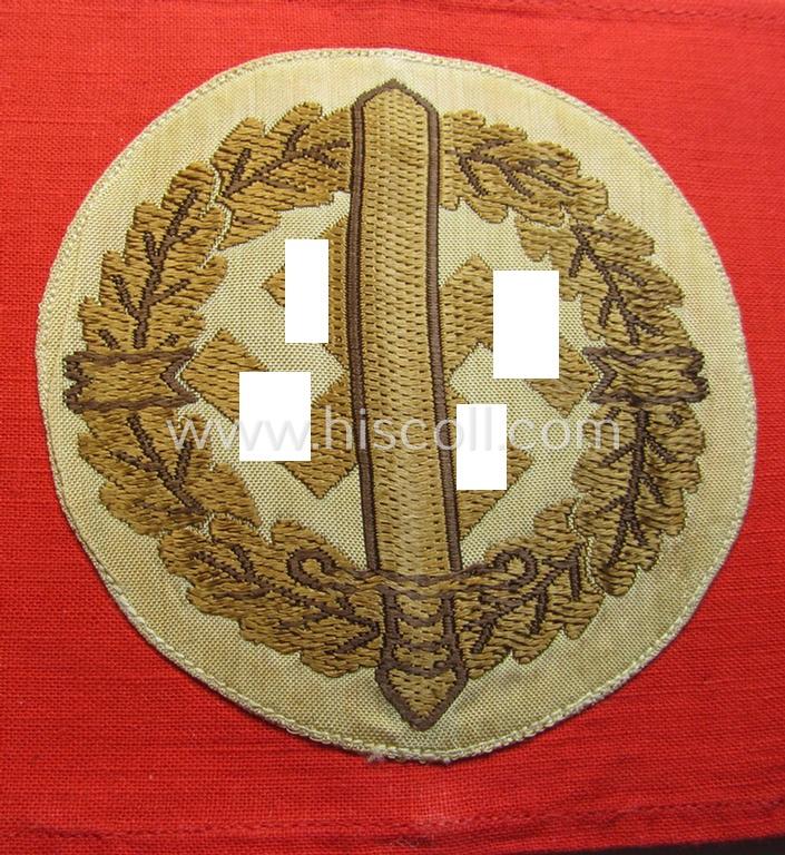 Attractive, linnen-based armband (ie. 'Armbinde') as was intended for usage by the staff of the: 'SA-Wehrmannschaften' (being a hardly used example that still shows its period-attached so-called: 'RzM'-etiket)