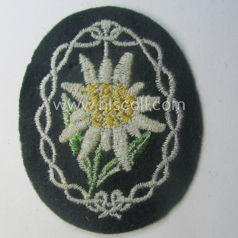 WH (Heeres) EM- (ie. NCO-) type: 'Edelweiss'-armpatch (being a machine-embroidered specimen)