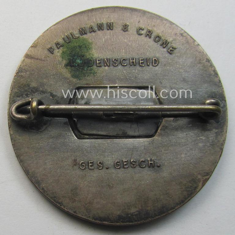 Commemorative, silvered 'Buntmetall'-based N.S.D.A.P.- (ie. WHW-) related 'tinnie' being a maker- (ie. 'Paulmann u. Crone'-) marked example depicting A. Hitler and text: 'Hitlers' Dank für den Dienst am Volke - Gau Süd-Hannover - Braunschweig...