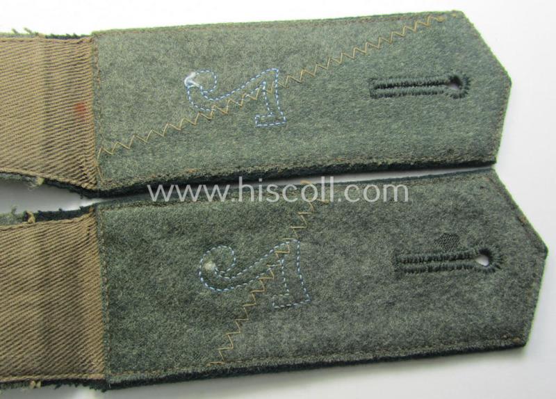 Pair of WH (Heeres),'cyphered' EM-type shoulderstraps: 'Soldat des Sanitäts-Abtlgs. 7'