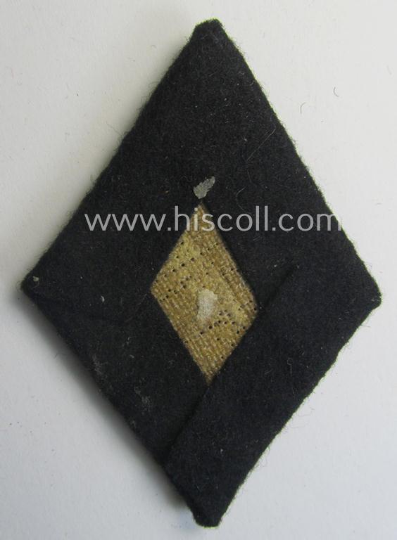 'SS'-related sleeve-diamond (ie.: 'Ärmelraute o. Schiessauszeichnung der 1. Stufe für Scharfschützen') being a very detailed- and hand-embroidered example that misses its 'RzM-Etiket'