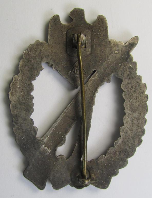 Moderately worn, 'Infanterie Sturmabzeichen in Silber' being a maker- (ie. 'MK' in a triangle-) marked (and/or minimally converse- ie. vaulted-) example by a to date still unidentified maker as was executed in silvered zinc-based metal ('Feinzin...