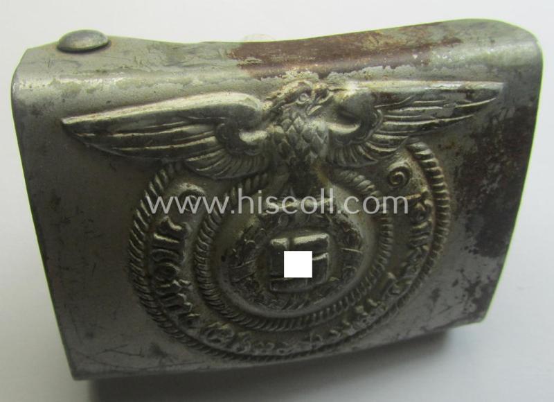Waffen-SS, EM- (ie. NCO-) type belt-buckle (being a typical, unmarked and typical steel-based: 'Overhoff & Cie'-example) that comes in a surely issued- and/or moderately used- ie. worn, condition