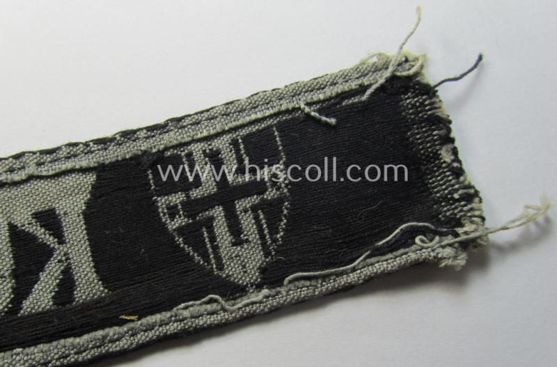 WH (Heeres ie. Kriegsmarine) cuff-title- ie. armband (ie. 'Ärmelstreifen') entitled: 'Kurland' that comes in an overall very nice- (albeit clearly used- ie. tunic-removed-), condition