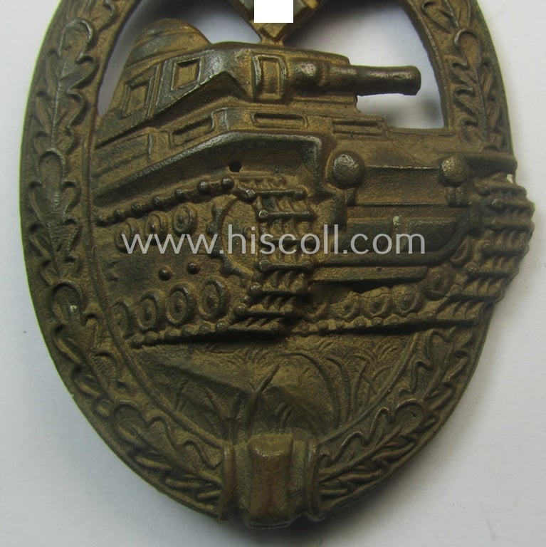 Incomplete 'Panzerkampfabzeichen in Bronze' (or: bronze-class panzer-assault badge or PAB) being a maker- (ie. 'AS' in a triangle-) marked- and/or typical zinc- (ie. 'Feinzink'-) based specimen as was procuced by a to date unknown maker