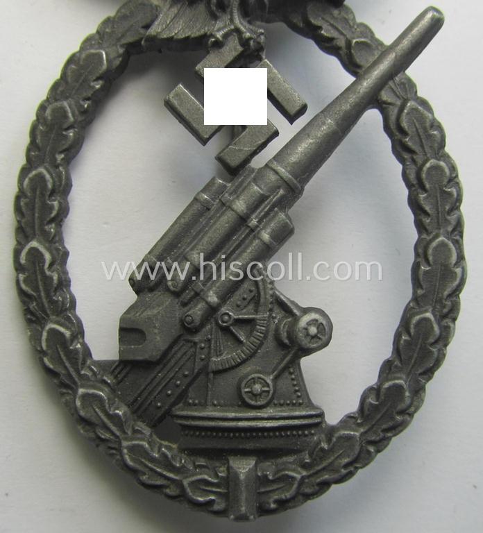 Attractive - and just moderately used! - 'Feinzink'-based example of a WH (Luftwaffe) 'Flakkampfabzeichen' being a very detailed albeit non-maker-marked example as was produced by the: 'Steinhauer & Lück'-company