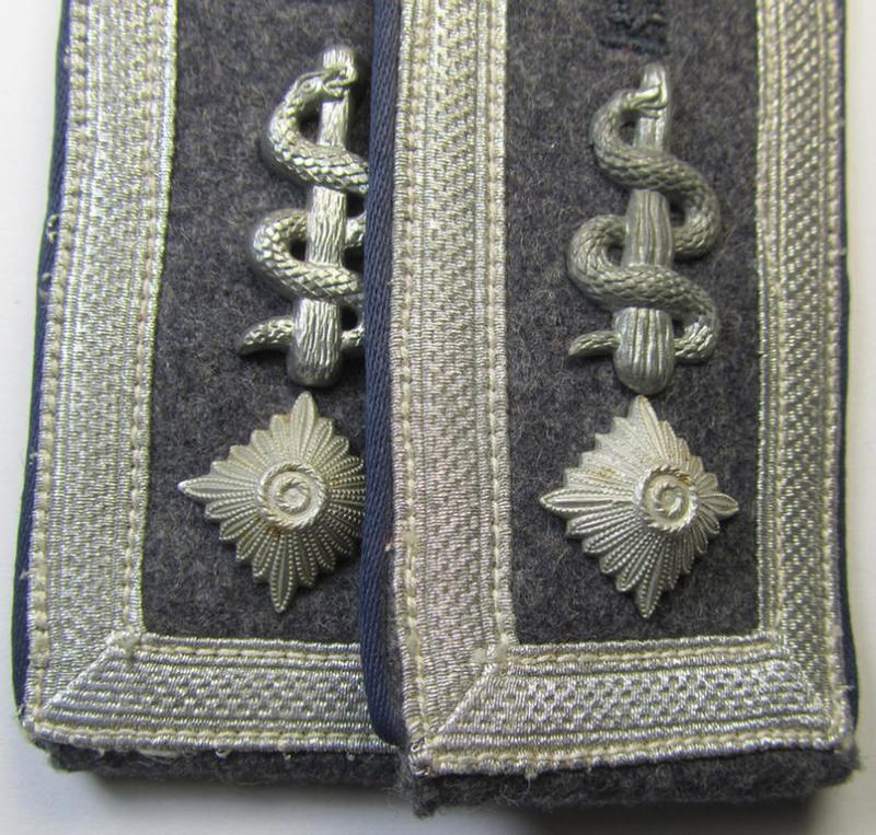 Superb - and/or fully matching! - neatly 'cyphered' pair of WH (Luftwaffe) NCO-type shoulderstraps as piped in the darker-blue-coloured branchcolour as was intended for a: 'Feldwebel der Sanitäts-Truppen'