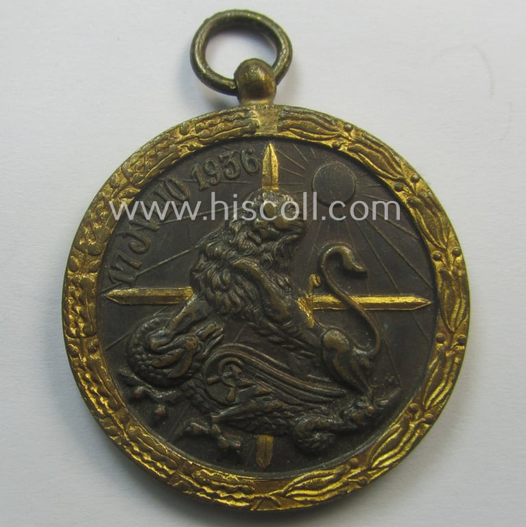 Spanish-issued, Spanish Civil-War commemorative-medal called: 'Medalla de la Campaña 1936-1939' that came together with its period piece of ribbon (ie. 'Bandabschnitt') as issued and/or recently found