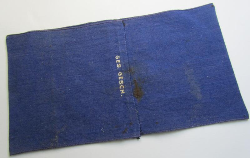 Attractive, darker-blue-coloured so-called: RLB (or: 'Reichsluftschutzbund') 'Amtsträger'-armband depicting the typical 'RLB'-logo (with lettering) and showing an interwoven 'Ges.Gesch.'-patent-pending-designation