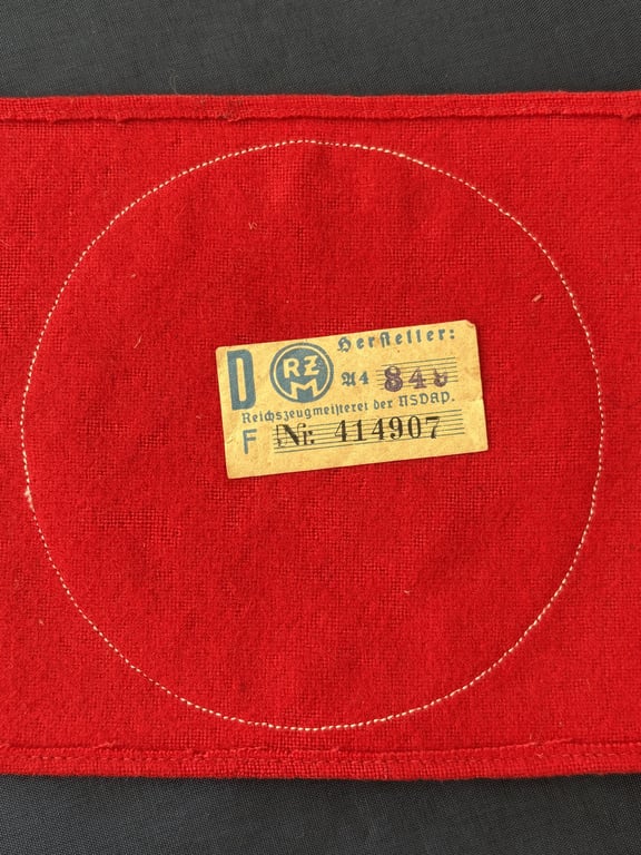WWII GERMAN POLITICAL LEADERS’ THIRD REICH NAZI ARMBAND WITH RZM PAPER TAG.