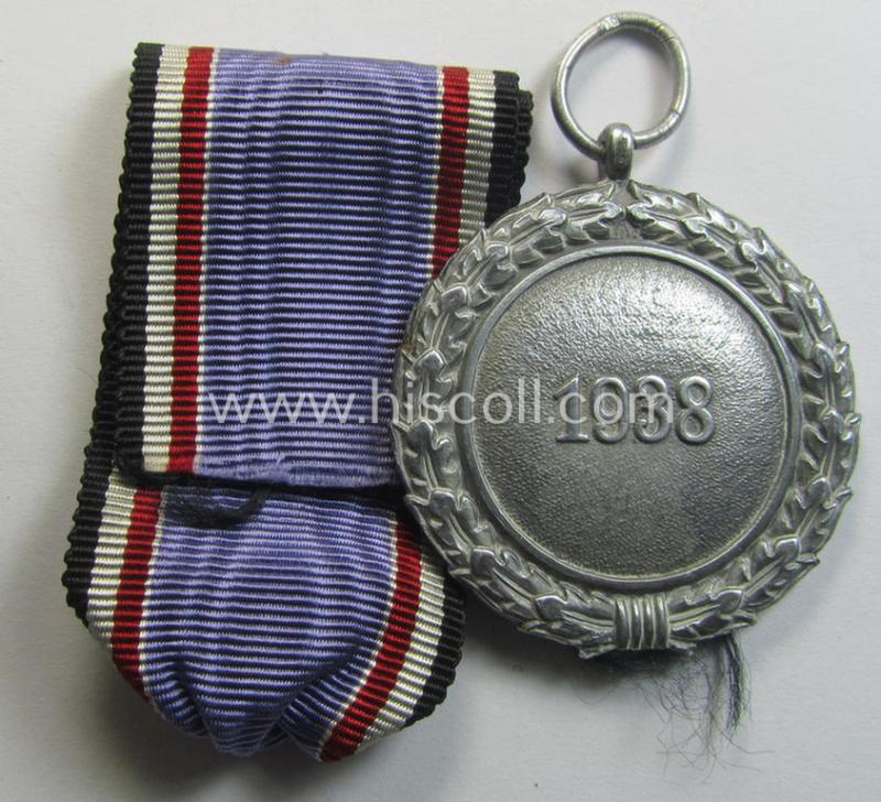 Atttractive, 'Luftschutz-Ehrenzeichen 2. Stufe' being a maker- (ie. '10'-) marked example as executed in zinc-based metal (ie. 'Feinzink') as was produced by the maker: 'Foerster & Barth'