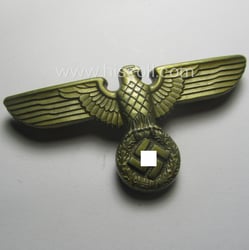 Golden-toned- and/or: zinc- (ie. laquered 'Feinzink'-based - (political-styled)...