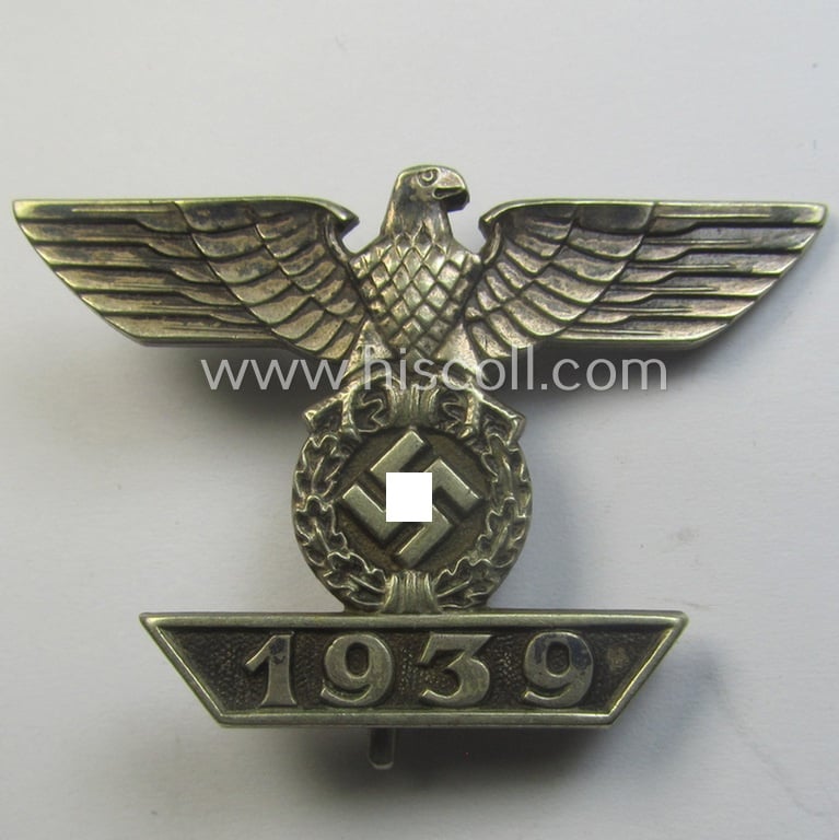 'Wiederholungsspange zum EK I. Klasse' (or: bar to the WWI IC first-class) as was produced by the (desirable!) maker (ie. 'Hersteller'): 'Eugen Schmidthaussler'